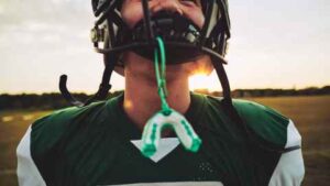 Wear a mouthguard during sports